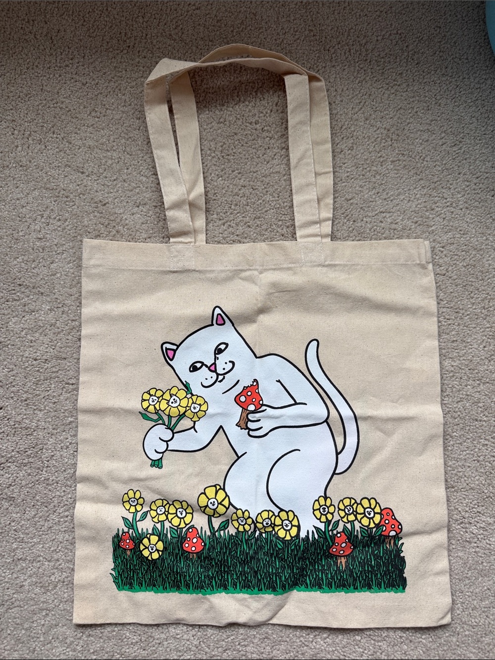 Ripndip Cream Tote with White Cat Holding Flowers and Red Mushrooms